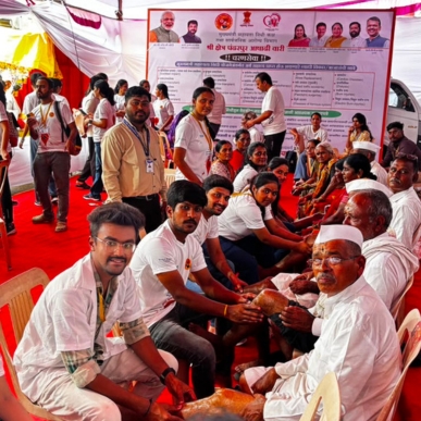 Charan Seva for Warkaris during the Ashadhi Wari pilgrimage at Pandharpur